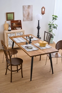 Nordic grey and white checkered fabric placemat on a minimalist solid wood dining table