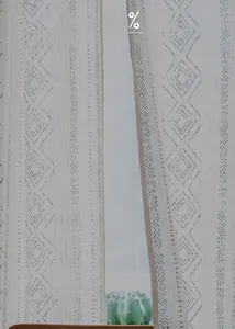 Detail view of cotton linen curtain with 50% shading and grey geometric patterns