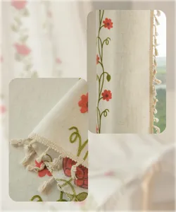 Detailed embroidery of red flowers and green leaves with elegant beige fringe on curtains
