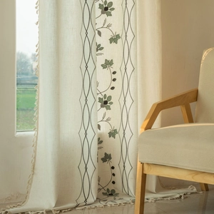Floral embroidered semi-blackout curtains with fringe tassels for a cozy living room