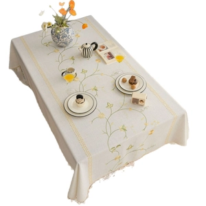 Nordic floral embroidered linen tablecloth with tassels for rustic dining decor