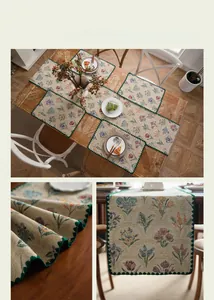 Floral jacquard table runner and placemat set with green scallop embroidery edges