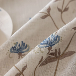 French cream tablecloth with floral embroidery and tassels for dining room decor