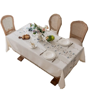 French country style rectangular tablecloth with cream floral embroidery and tassels