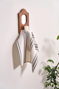 Nordic wall-mounted walnut wood candle holder with mirror and grey striped linen cloth