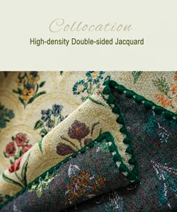 Detail of French vintage floral jacquard tablecloth with high-density weave and crochet edge