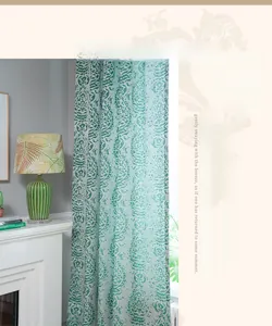 Detailed close-up of green jacquard fabric curtain featuring retro waterdrop patterns