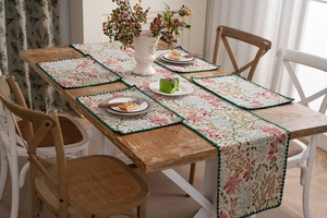 Floral table runner and placemats set with pink lily jacquard and green wavy edges