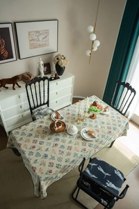 Close-up detail of French vintage floral jacquard tablecloth with tulip pattern