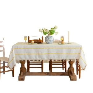 Cream French style rectangular tablecloth with yellow embroidery and white tassels