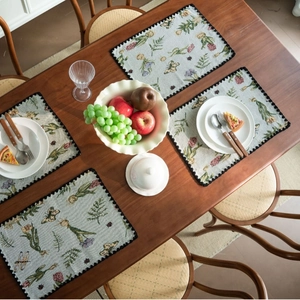 Floral butterfly jacquard table runner and rectangular place mats with wavy crochet borders