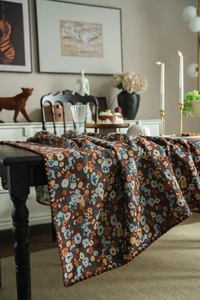 Close-up of retro floral jacquard fabric with vintage blue and yellow flowers