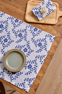 Close-up of French pastoral floral print napkin in cotton linen fabric for table decor