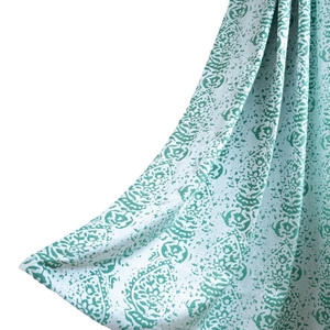 Green damask patterned sheer curtain with vintage jacquard texture and natural drape