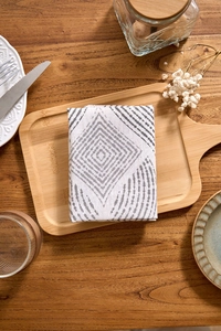 Detail shot of modern grey geometric pattern on cotton linen napkin for home table decor
