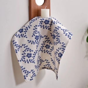 French country style cream napkin with blue vine floral print on textured cotton linen
