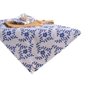 French country style linen napkin with blue ivy floral print and matching small square cloth