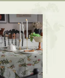 Close-up of French vintage tablecloth with botanical floral embroidery and jacquard texture