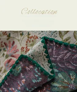 Detail of French vintage floral jacquard tablecloth with double-sided colored yarn weaving