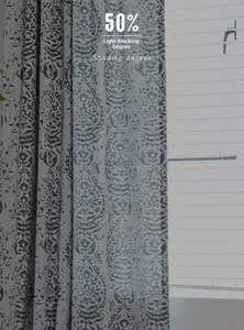 Detail of grey damask jacquard curtain with 50% shading degree for home decoration