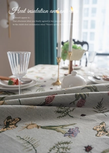 Close-up of French vintage floral embroidery on heavy heat-resistant tablecloth