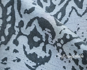 Macro detail of jacquard curtain fabric with gray abstract droplet textures