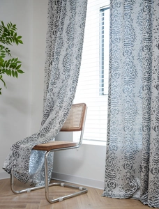 Close-up of vintage damascus jacquard curtains in grey with elegant teardrop patterns