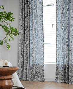 Detailed view of damask pattern jacquard grey curtains with elegant drape and fabric texture