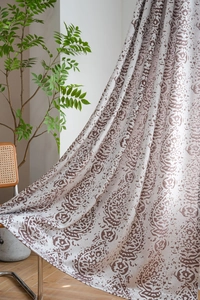 Detailed view of grey American vintage jacquard curtain fabric with ethnic waterdrop pattern