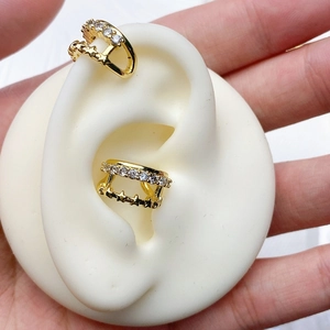 Double-layer gold ear cuff set with white zircon stones and hollow star patterns
