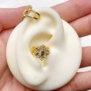 Detail of 18K gold plated ear cuff set with vintage portrait and zircon stones