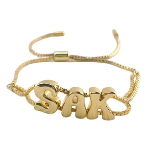 Adjustable 18k gold plated box chain bracelet featuring SAK puffy letter charms