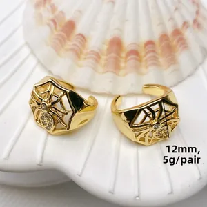 Detail of 12mm spider web ring in 18K gold plating with white cubic zirconia stones