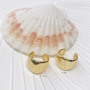 Detailed view of 18K gold plated wavy ear cuffs with 8.5mm size and 2.3g weight specs