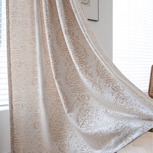 Close-up of beige Damascus jacquard fabric showing premium texture and patterns