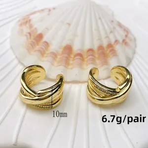 Detail of 10mm U-shaped gold layered ear cuffs with pavé crystals weighing 6.7g per pair