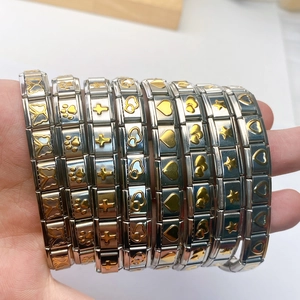 Bracelet modulaire italien en acier inoxydable avec breloques dorées papillon et coeur