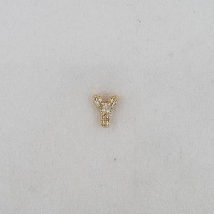 Close-up of golden balloon bubble letter Y pendant with micro-paved cubic zirconia stones