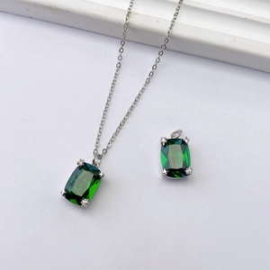 Elegant silver chain necklace with a rectangular emerald green zircon pendant and micro-pave