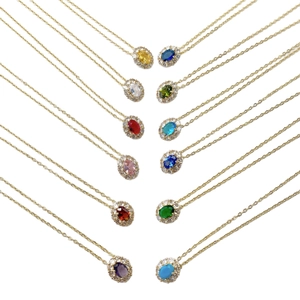 Elegant gold oval birthstone halo necklace pendants in twelve vibrant zircon colors