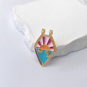 Handcrafted gold tarot necklace pendant with colorful enamel sunset and ocean scenery