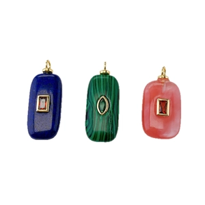 Three natural stone pendants in blue, green, and pink with elegant gold metal loops