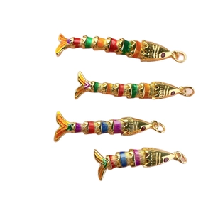 Set of flexible colorful enamel tropical fish pendants in gold plated copper for DIY jewelry