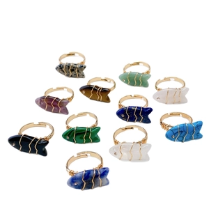 Set of 11 fish-shaped natural stone wire-wrapped rings with adjustable gold-tone bands