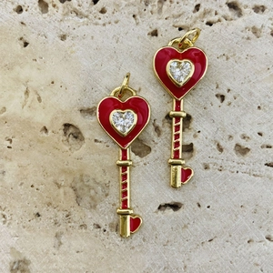 Golden heart key pendant necklace with red enamel and sparkling zircon crystal inlay