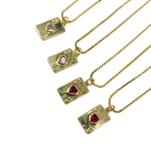 Set of four gold mini playing card necklaces with heart charms and crystal accents