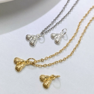 Gold and silver double sphere flower pendant necklaces with intricate woven texture