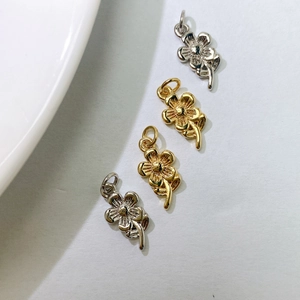 Minimalist flower pendant charms in gold and silver for DIY jewelry necklaces