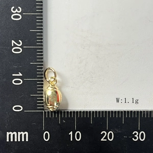 Detailed size measurement of 10mm golden oval flower pendant weighing 1.1g for DIY jewelry