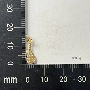 Detailed size view of a 15mm gold tennis racket pendant with scale measurement